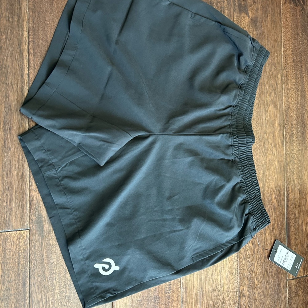 2 Pairs of Shorts

Black and Navy Athletic Shorts with Logo